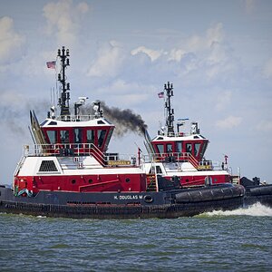 BH Towing H DOUGLAS M and ZYANA K racing for home on Houston Ship channel, Galveston Bay