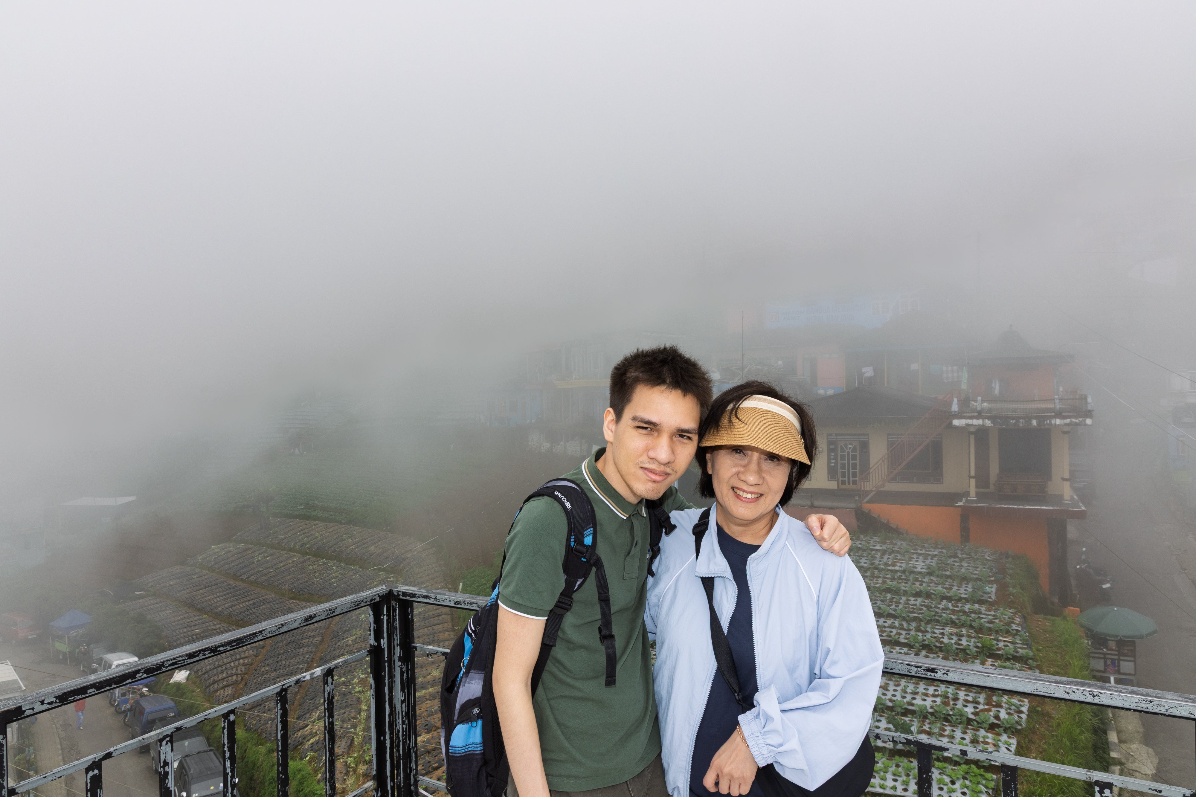 Wife & Son with the clouds clearing at Nepal van Java, Magelang, Indonesia